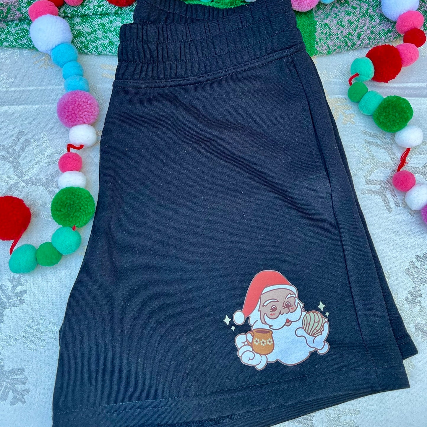 Women’s Black Jogger High-rise Shorts with a Santa holding a Concha