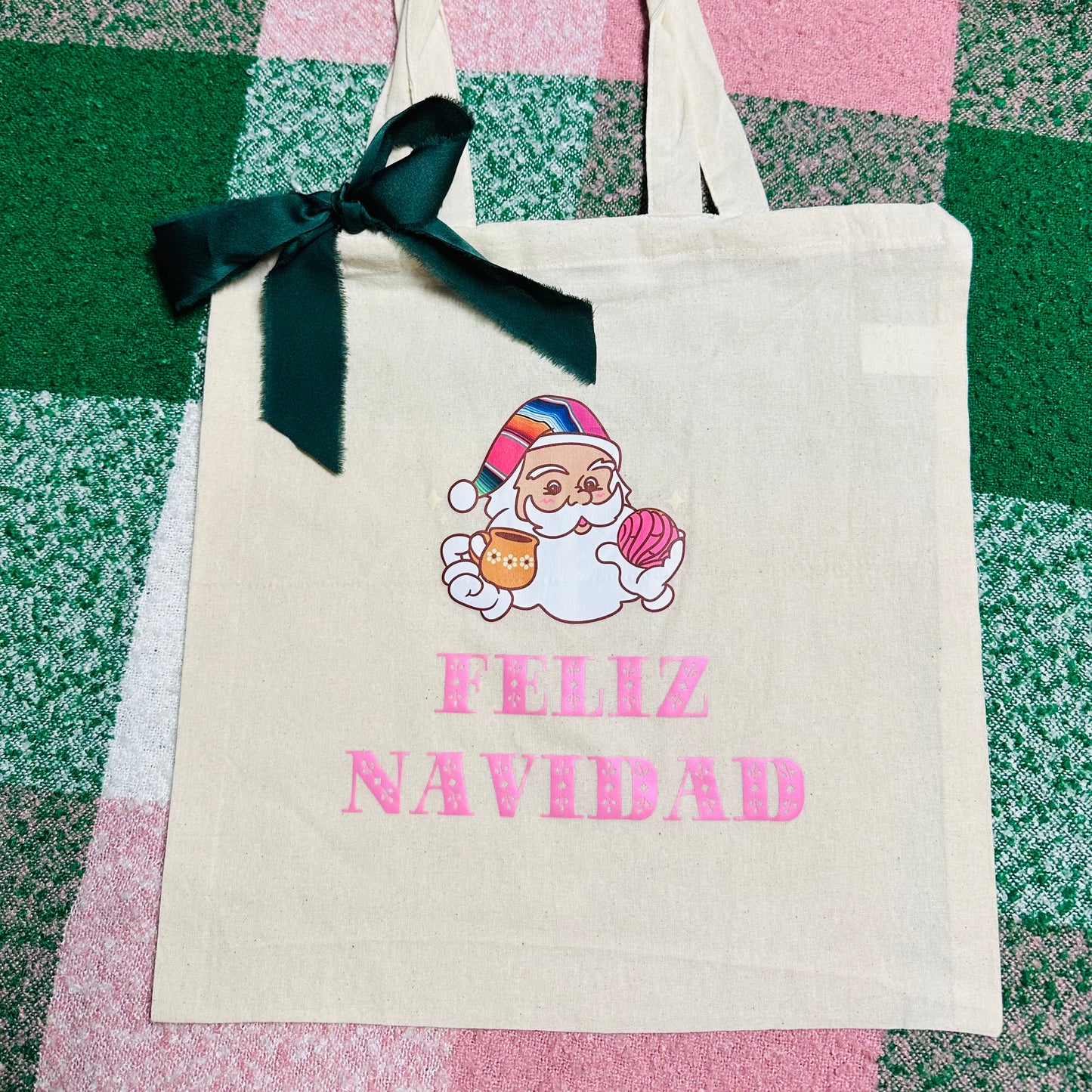 Santa holding a Concha (Feliz Navidad) Tote Bag